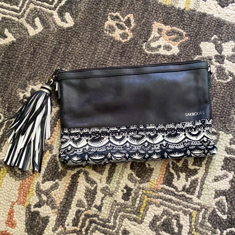 Black artist circle tassel clutch